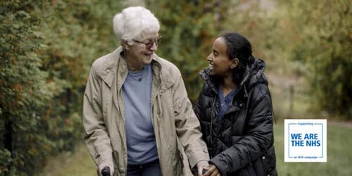 woman carer with old man