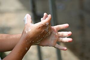A child washing hands